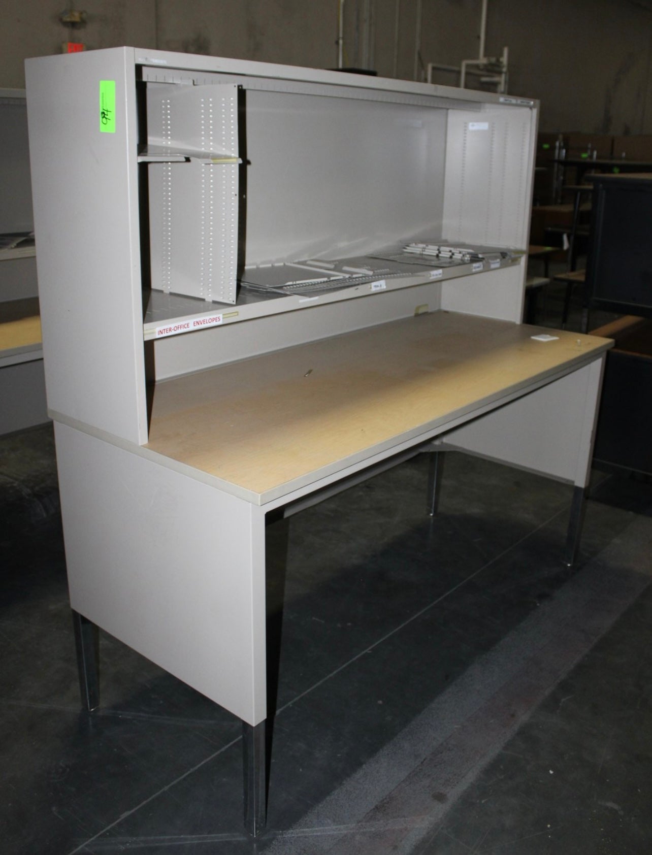 Pitney Bowes desk with an overhead mailroom component