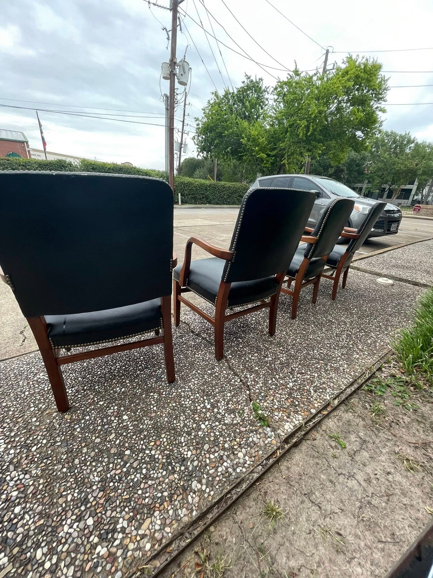 Set of 4 Gunlocke black leather office chairs late 20th century